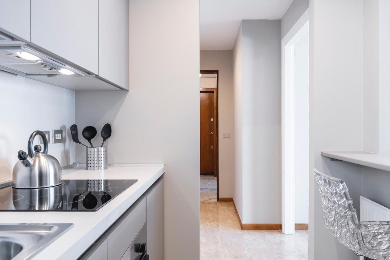 Contempora Apartments - Elvezia 8 - E33 ミラノ エクステリア 写真